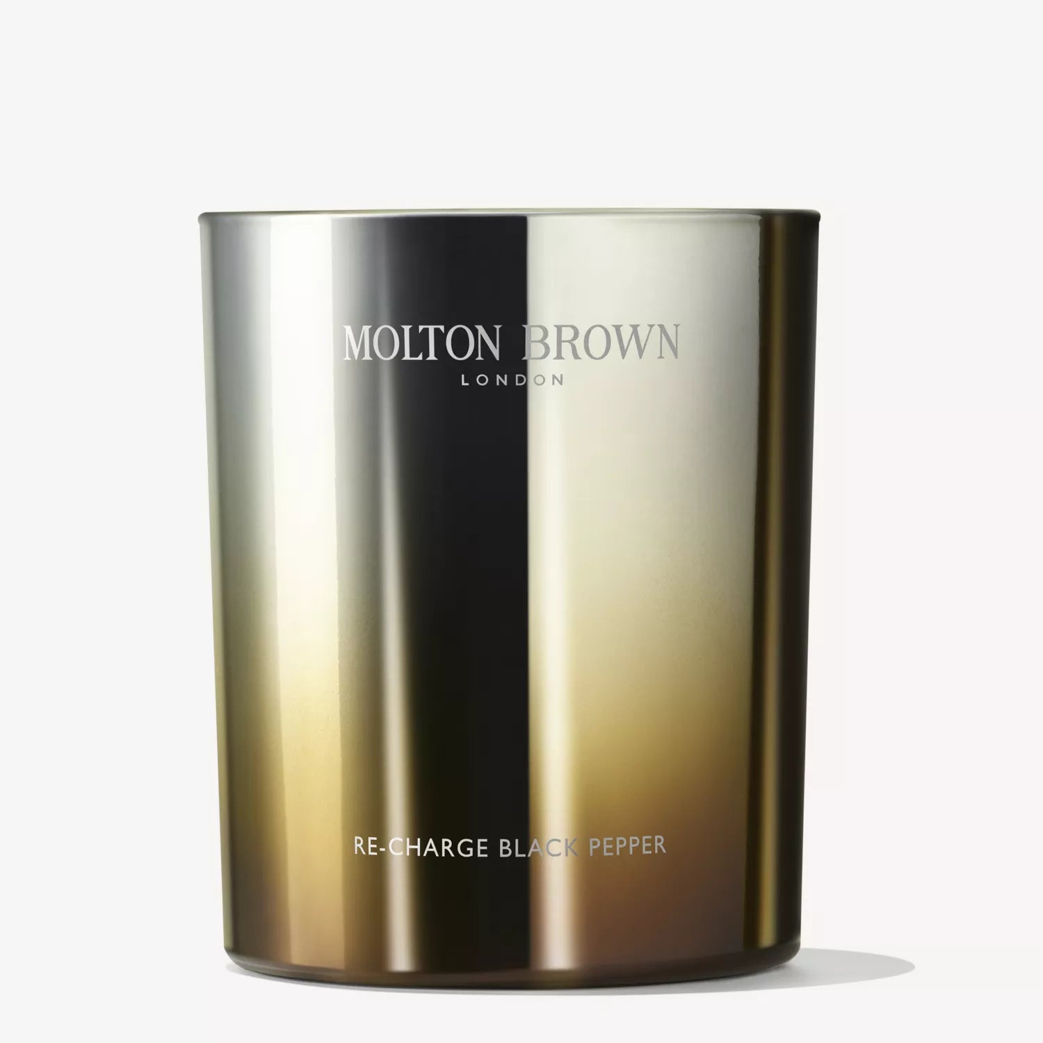 A limited edition MoltonBrown Cyprus Re-Charge Black Pepper Signature Candle 190g features a metallic gradient design and infuses your space with a woody, spiced fragrance; MoltonBrown London branding on front, set against a white background.