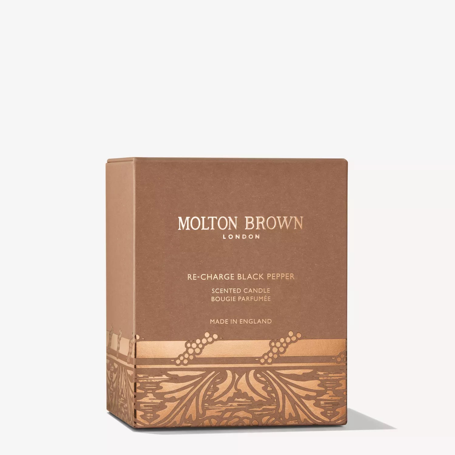 A brown box with gold accents, labeled MoltonBrown Cyprus Limited Edition Re-charge Black Pepper Signature Candle 190g. Its stylish design hints at the woody, spicy fragrance within—ideal for creating an inviting atmosphere.