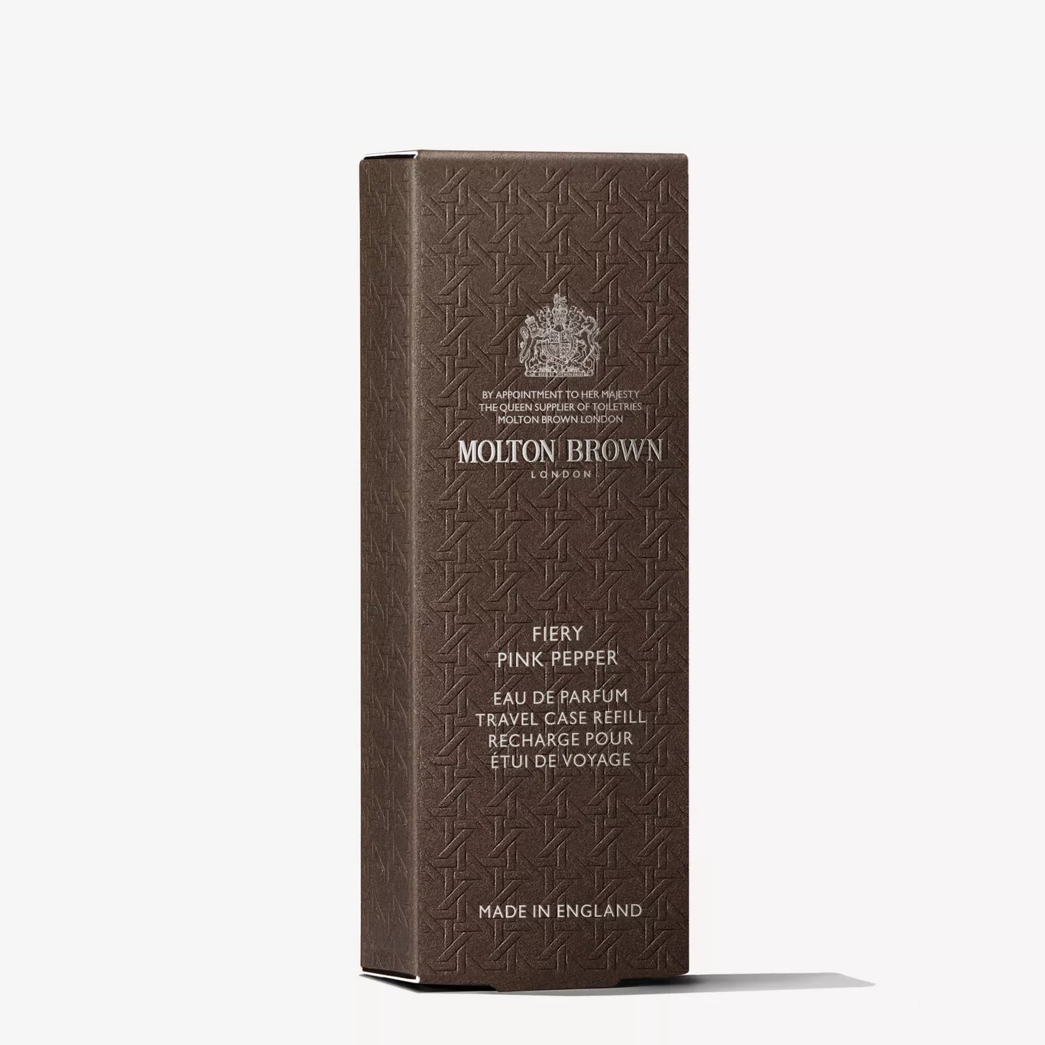 A Sample 1 box, featuring a brown rectangular design with a textured pattern, displays the MoltonBrown Cyprus logo and is labeled as Fiery Pink Pepper Eau de Parfum Travel Case Refill. Crafted in England, it is infused with spicy pink pepper.