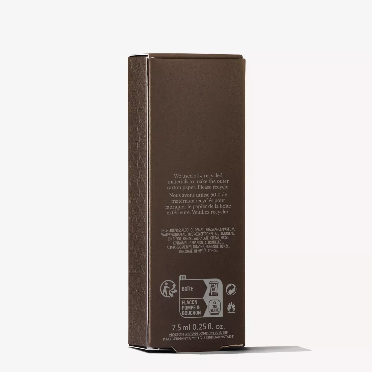 A brown rectangular cardboard package from MoltonBrown Cyprus highlights its eco-friendly design, made with 50% recycled materials. It details the Sample 1 Eau de Parfum, featuring ingredients such as spicy pink pepper and patchouli, along with recycling symbols and a product volume of 7.5 ml.