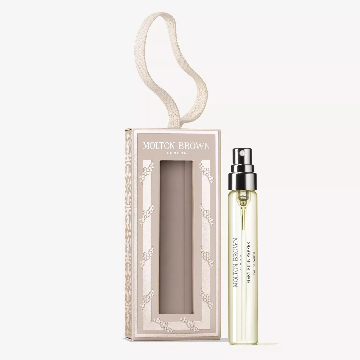 A MoltonBrown Cyprus Fiery Pink Pepper Fragrance Bauble 7.5ml sits next to its rectangular, beige-patterned box featuring a cutout window and a ribbon loop on top for hanging.