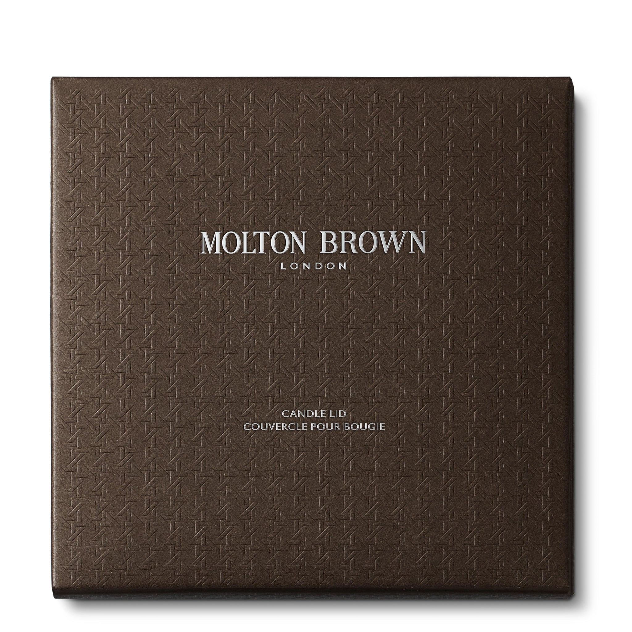 A square box with a textured brown pattern showcases the brand MoltonBrown Cyprus in white letters. Below, it states "Luxury Candle Lid 154g," indicating its use with scented candles.