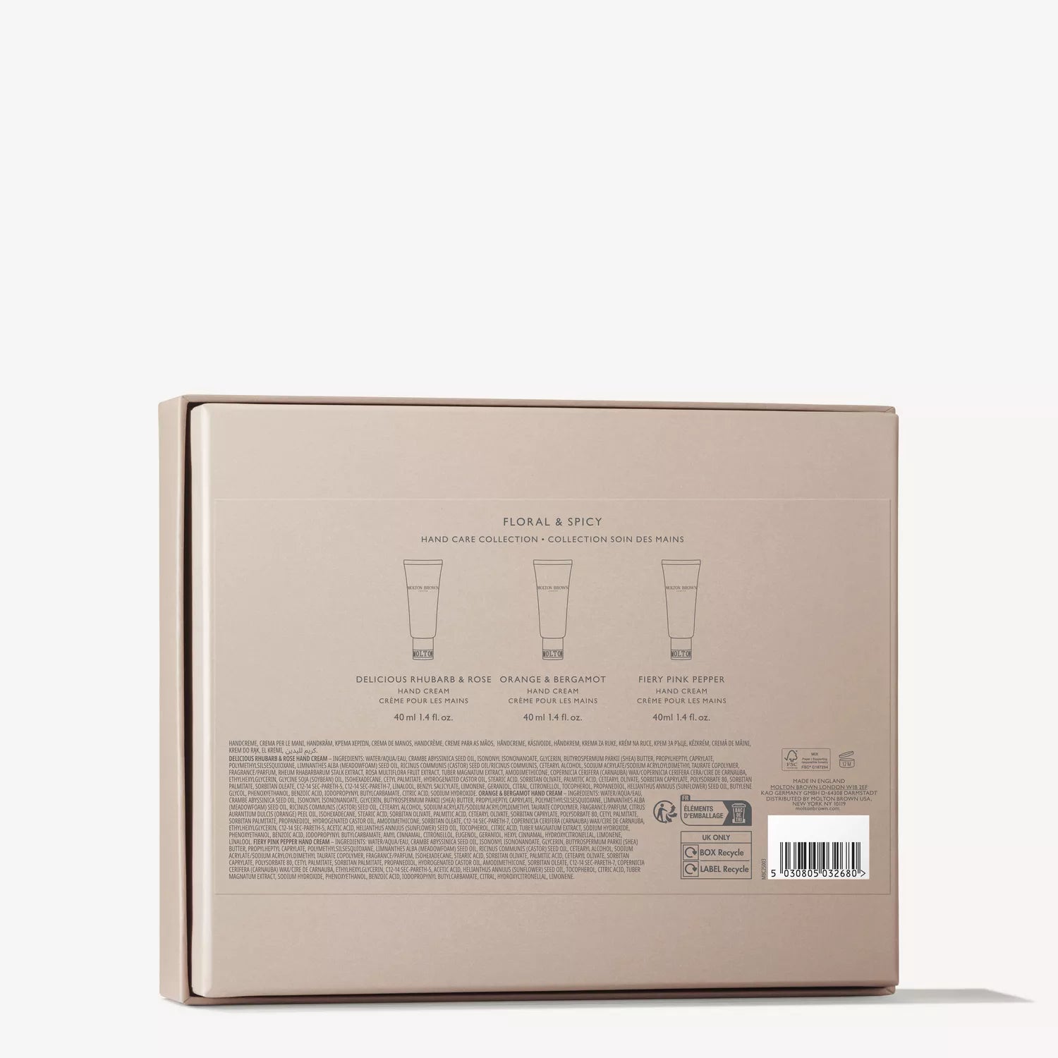 The back of the beige Floral & Spicy Hand Care Gift Set by MoltonBrown Cyprus displays classic scents—Delicious Rhubarb & Rose, Orange & Bergamot, and Fiery Pink Pepper—with shea butter, plus details and a barcode at the bottom right.