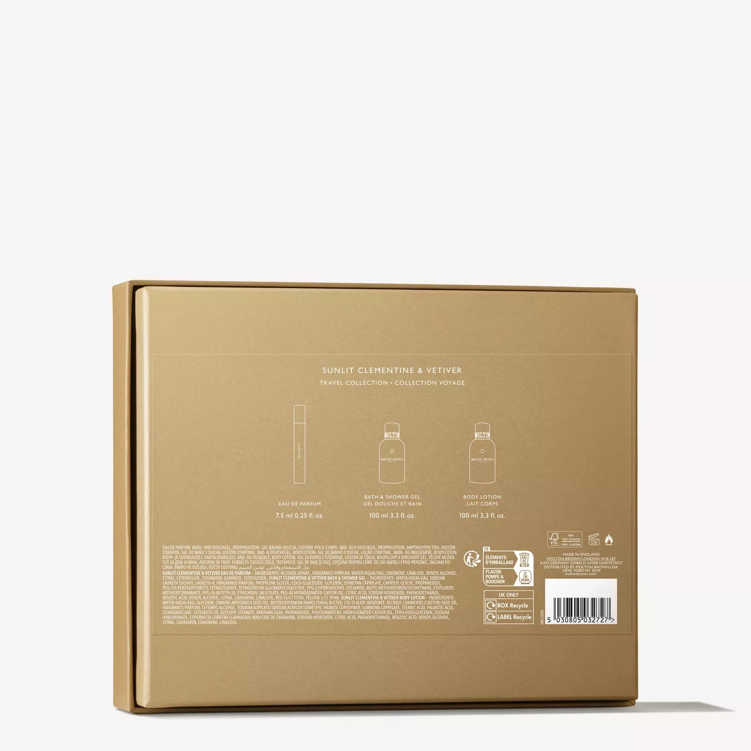 Gold box (back view) displays product info, barcode, and icons. Text reads: MoltonBrown Cyprus Sunlit Clementine & Vetiver Travel Gift Set with citrus perfume, travel-size body wash, and fig leaf lotion.