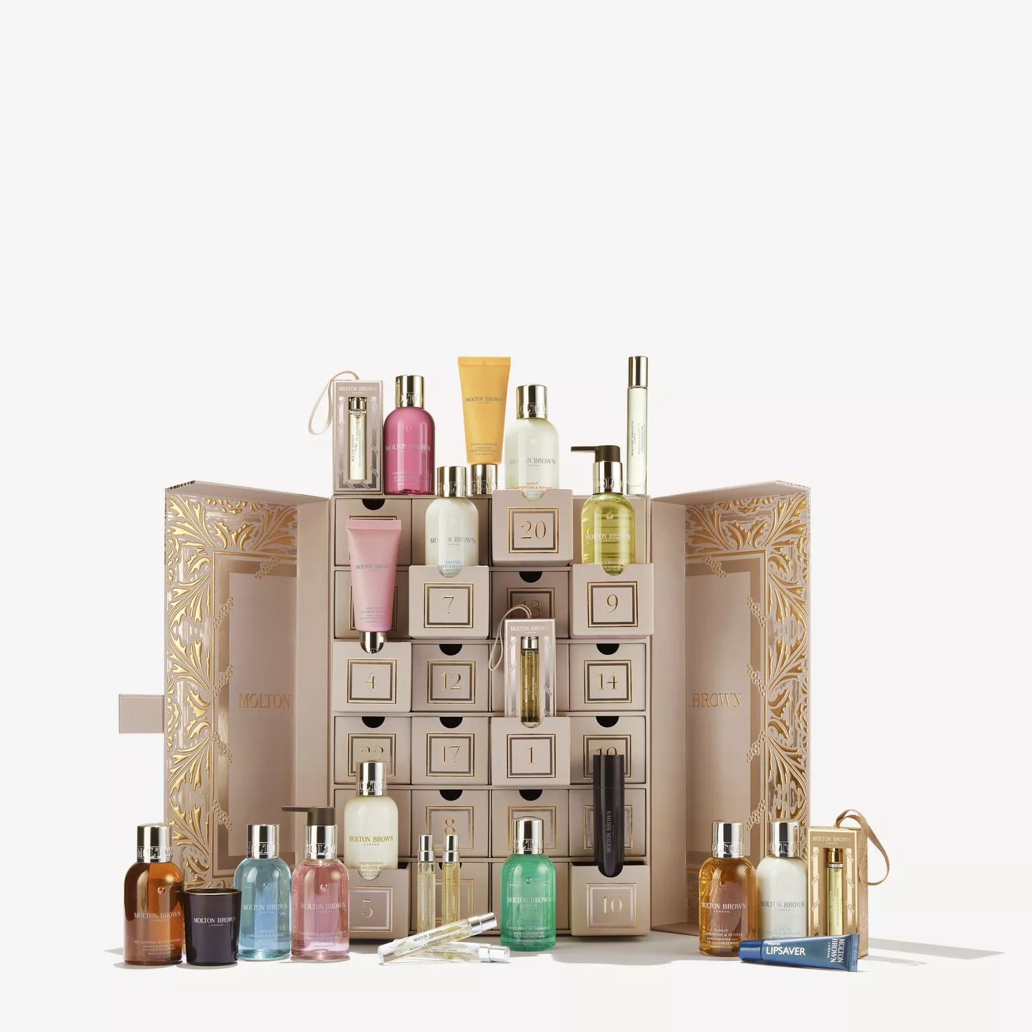 Discover the Advent Calendar by MoltonBrown Cyprus—a luxurious box with 24 numbered drawers, each filled with beauty and bath products in assorted bottles, tubes, and sprays—elegantly displayed when the box is open.