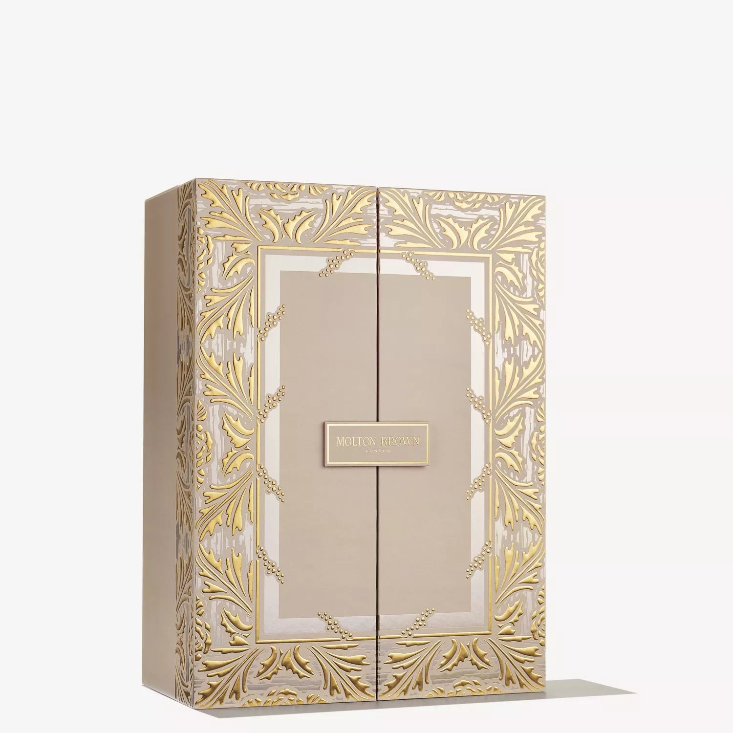 MoltonBrown Cyprus Advent Calendar: This Limited Edition features a luxurious beige gift box with gold leaf patterns and a double-door design, filled with festive scented treasures for an elegant holiday experience.