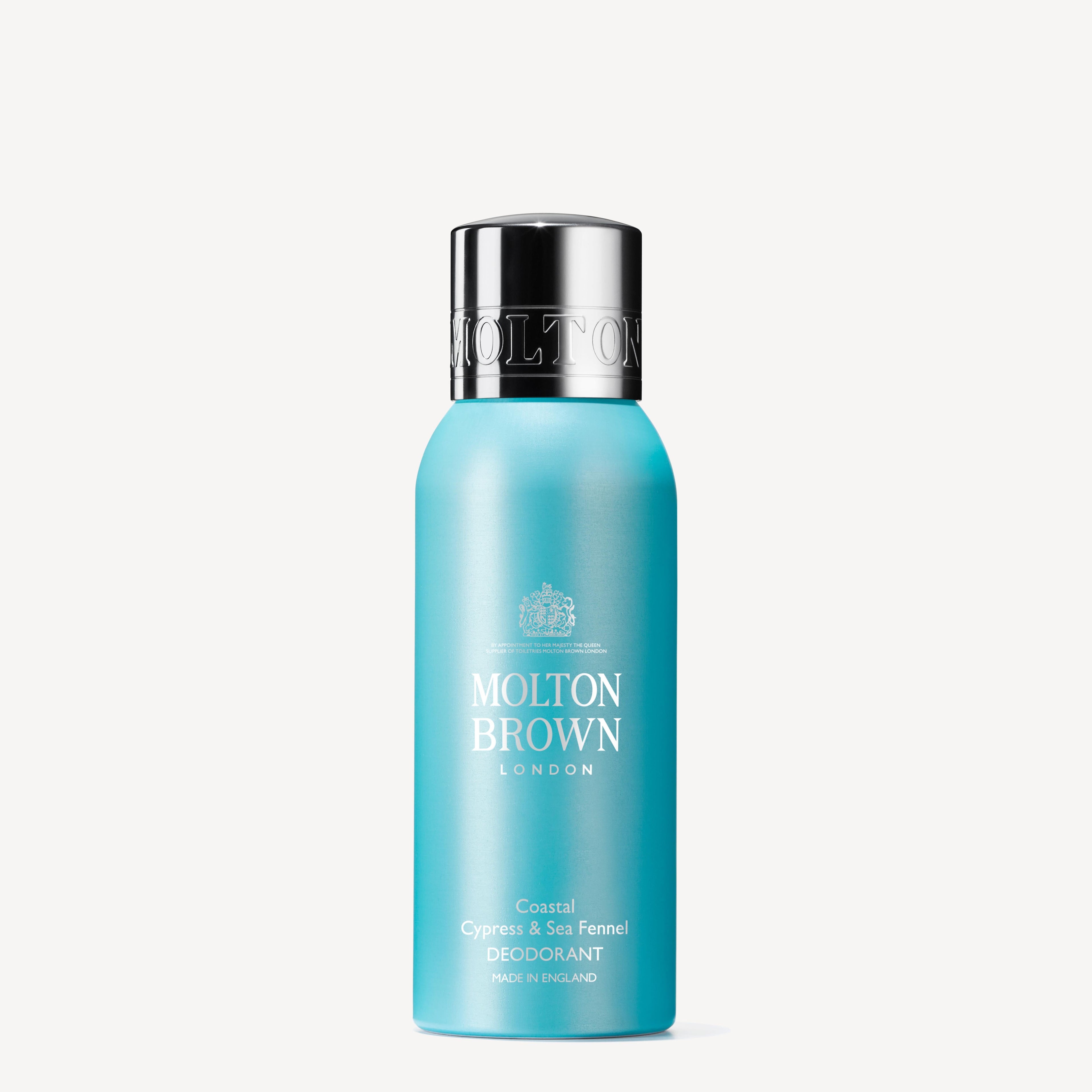 A MoltonBrown Cyprus Coastal Cypress & Sea Fennel Deodorant, presented in a light blue cylindrical bottle with a silver cap and elegant branding, emanates marine notes with subtle hints of cedarwood, all displayed against a plain white background.