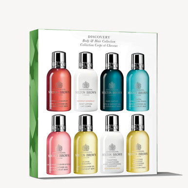 Explore MoltonBrown Cyprus's travel-size bathing essentials with the Discovery Body and Hair Collection. This set includes eight vibrant body and hair product bottles, each in a unique color and scent. Elegantly packaged, the white box with a green border is perfect for indulgence on the go.