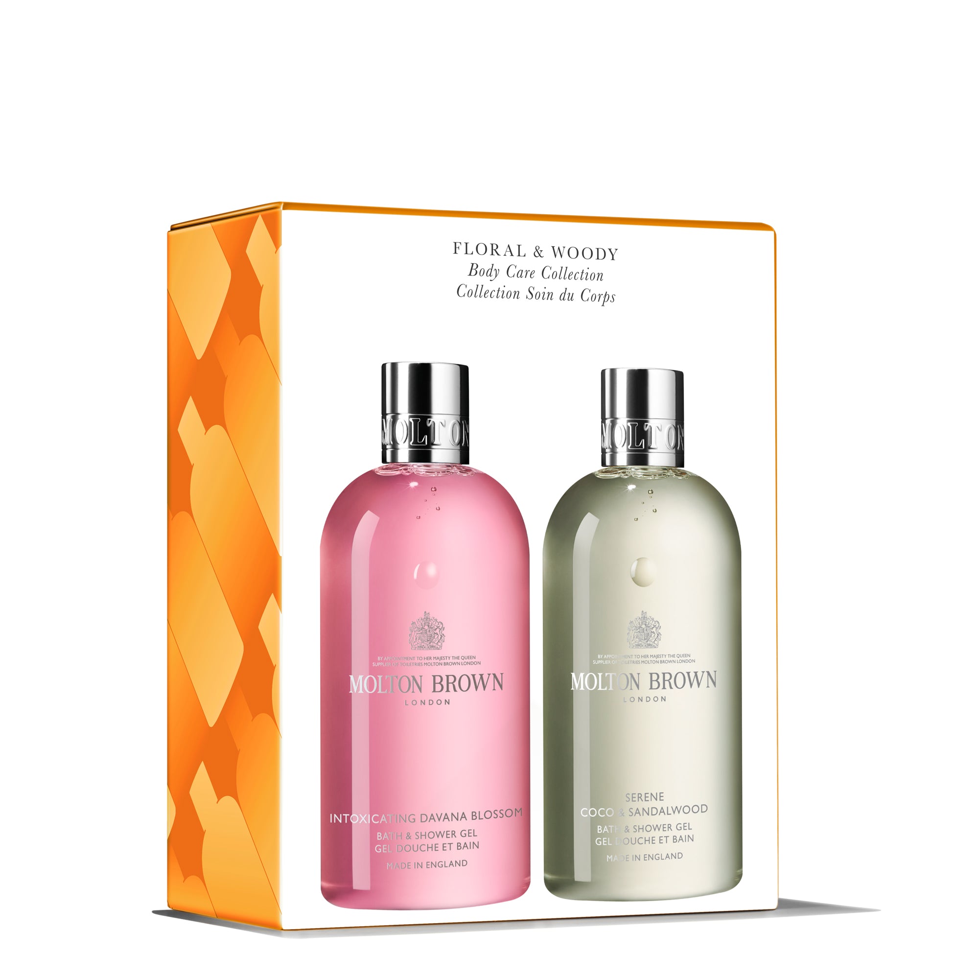 A boxed set called the Floral & Woody Body Care Duo by Molton Brown Cyprus includes two bottles: the left, pink-labeled Intoxicating Davana Blossom, and the right, green-labeled Serene Coco & Sandalwood. The luxurious box features an elegant orange pattern.