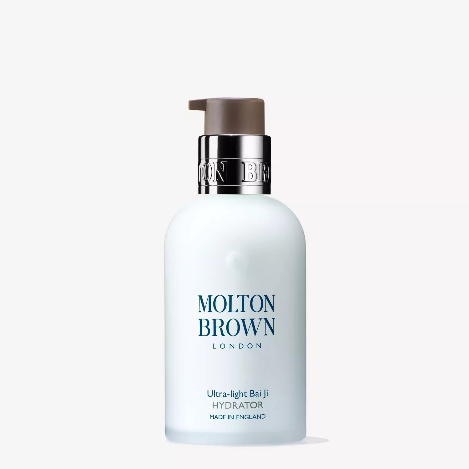 A white 100ml bottle of Molton Brown Cyprus Ultra-light Bai Ji Hydrator, enriched with bai ji extract, features a dark pump top against a light background. The label proudly reads Made in England.