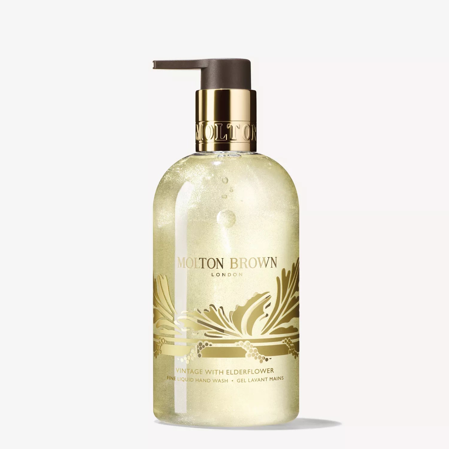 A clear pump bottle of MoltonBrown Cyprus Vintage With Elderflower Fine Liquid Hand Wash 300ml with gold accents and label offers a refreshing floral-fruity scent, displayed on a white background.