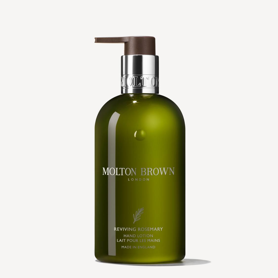 A green pump-top bottle of MoltonBrown Cyprus Reviving Rosemary Hand Lotion 300ml, with silver and white label text and a brown dispenser, is displayed against a white background.