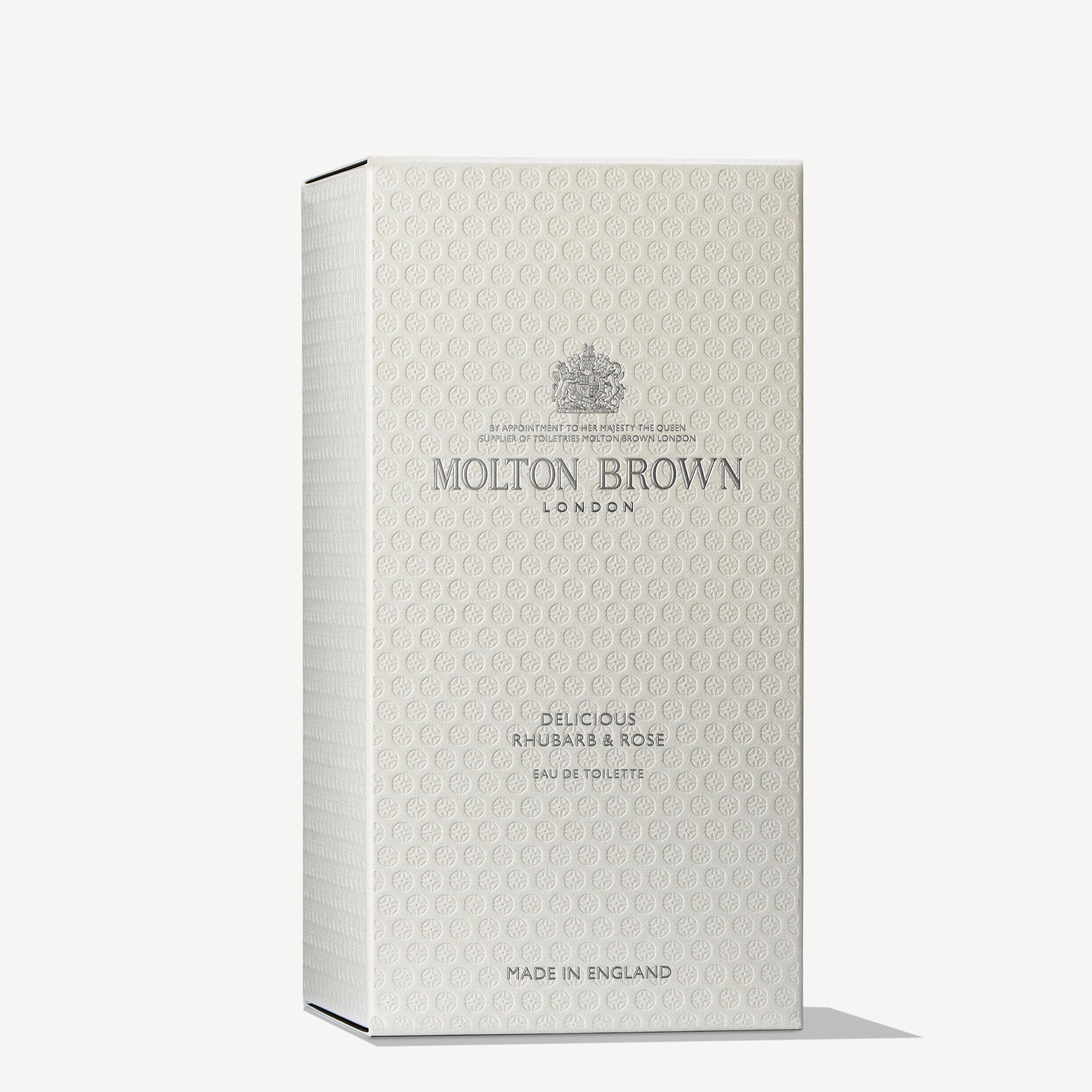 The MoltonBrown Cyprus box highlights their Delicious Rhubarb & Rose Eau de Toilette 100ml, enriched with notes of grapefruit and rhubarb leaf. The sophisticated packaging boasts embossed patterns and prominently features the text Made in England.