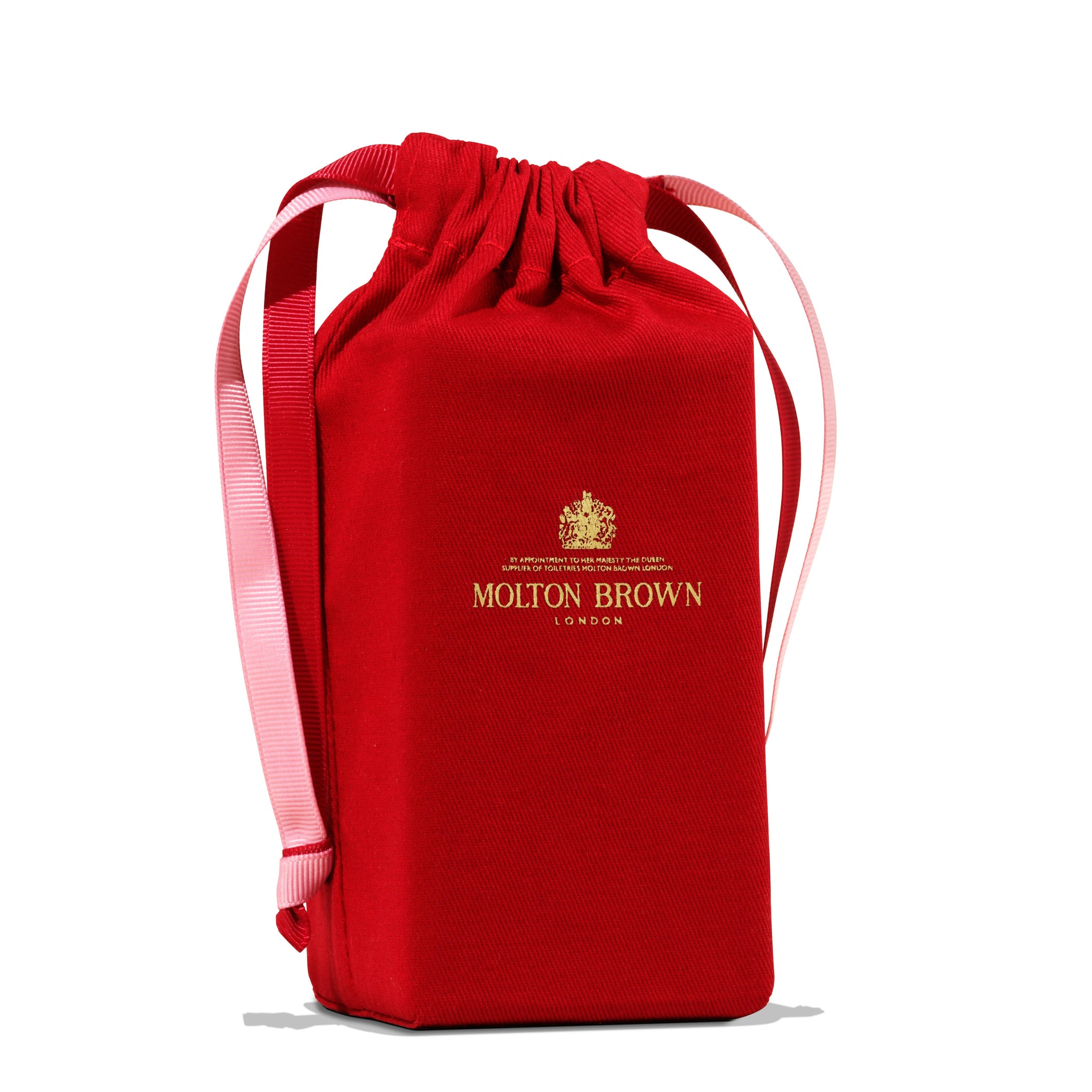 A luxurious red drawstring bag with pink handles, highlighted by the MoltonBrown Cyprus logo in gold, emanates a serene elegance as enchanting as the Milk Musk Eau de Parfum 100ml.