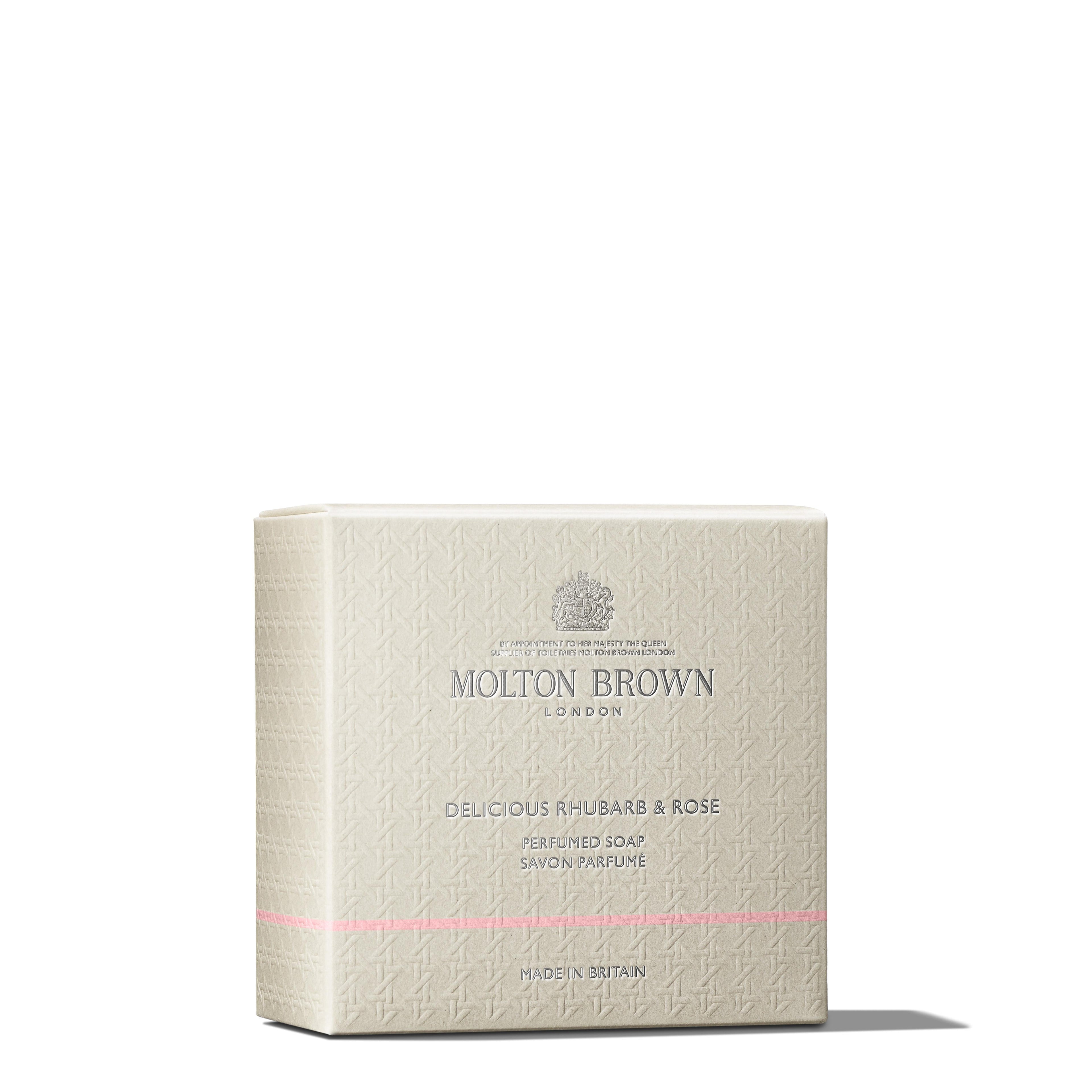 A beige box of MoltonBrown Cyprus Rose Dunes Body Lotion 300ml, featuring intricate pattern details and an ambery-rose scent. The label and branding highlight the product's luxurious aesthetic, with "Made in Britain" noted at the bottom.