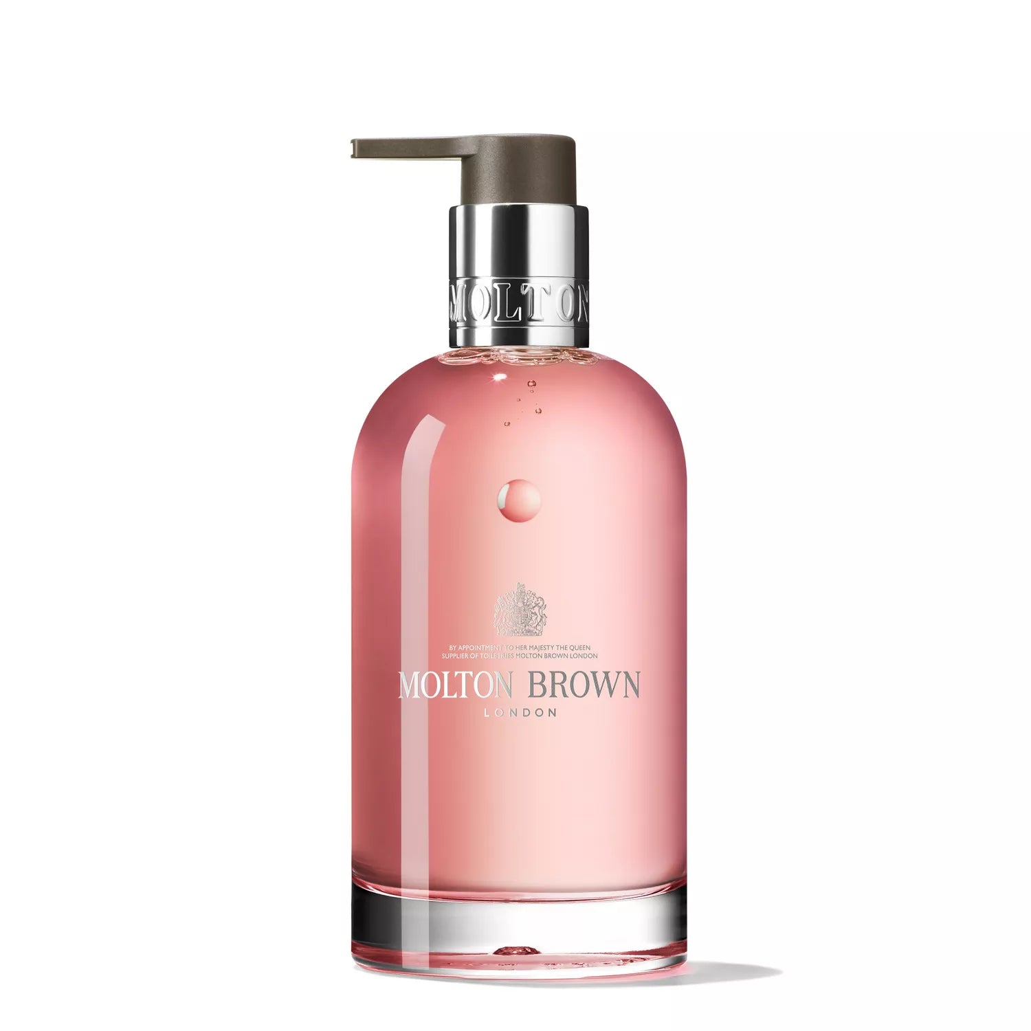 The MoltonBrown Cyprus Delicious Rhubarb & Rose Fine Liquid Hand Wash comes in a clear glass bottle containing pink liquid. It features a metal pump dispenser, silver label, and white printed brand name with decorative details. A metallic gray cap completes this recyclable beauty.