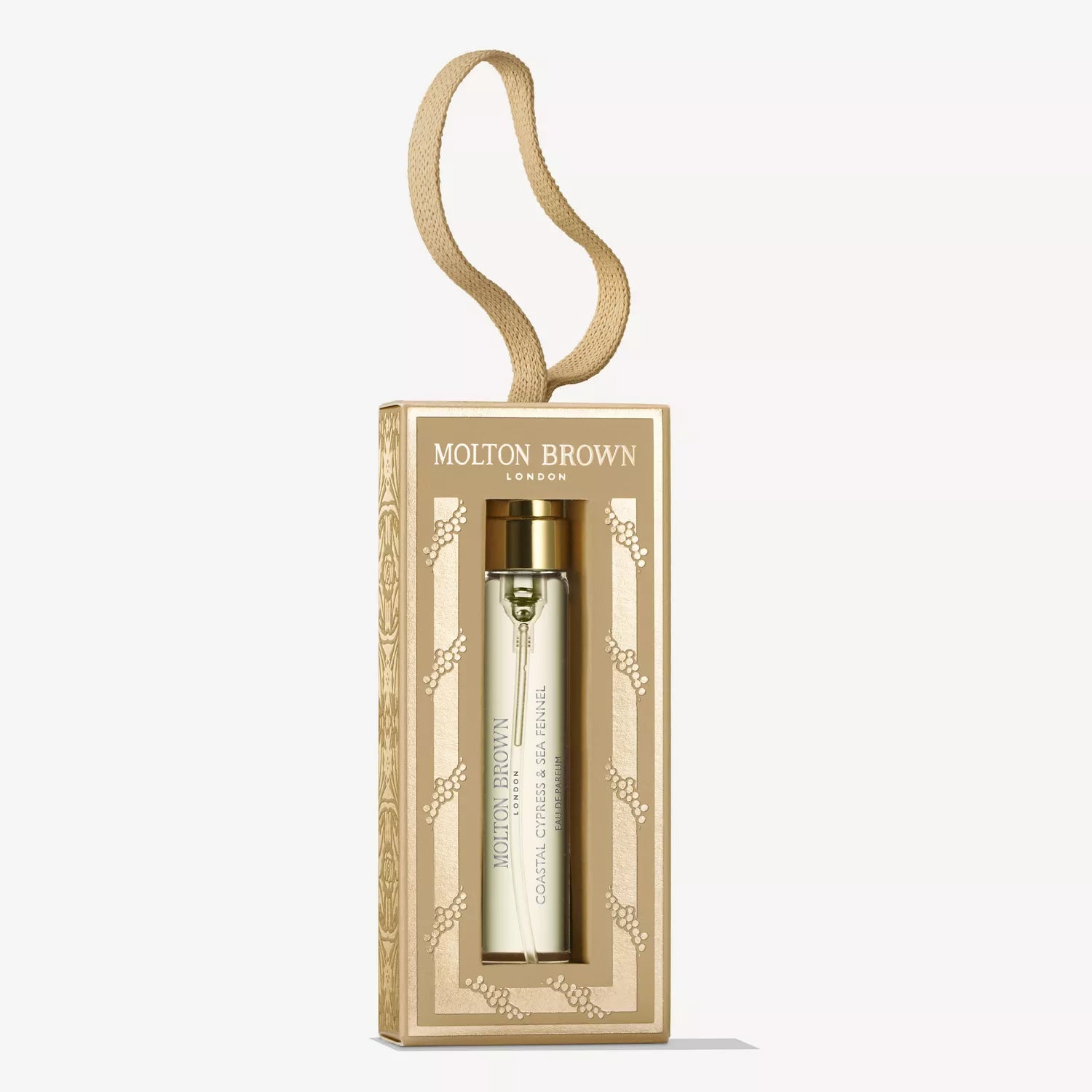 A gold MoltonBrown Cyprus Coastal Cypress & Sea Fennel Fragrance Bauble 7.5ml is shown in a matching gold and beige box with a decorative loop, set against a plain white background, evoking refined marine notes.