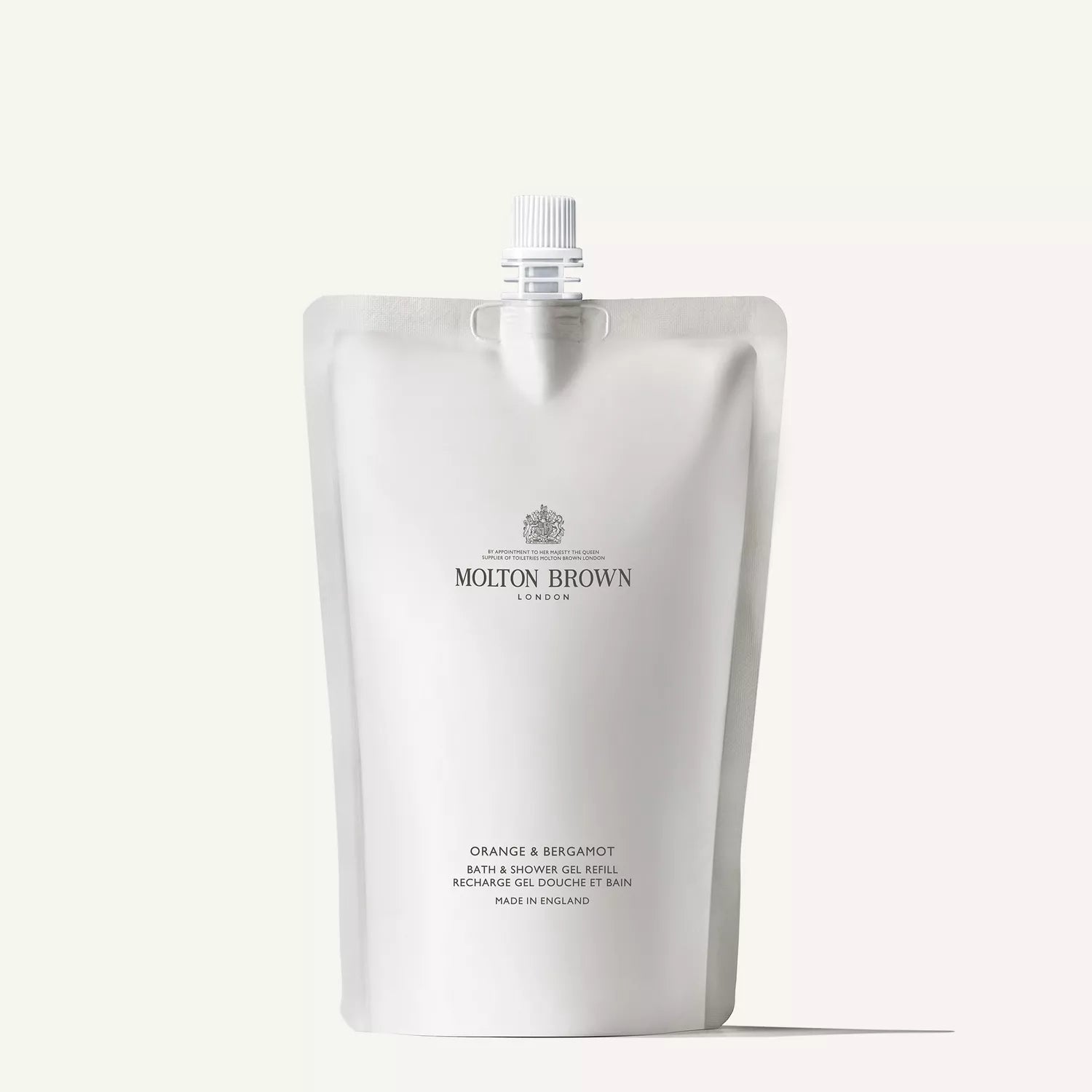 Molton Brown Cyprus offers a 400ml white refill pouch of their Orange & Bergamot Bath & Shower Gel, designed to reduce waste. This citrus-scented body wash pouch displays the brand logo and product name in dark text.